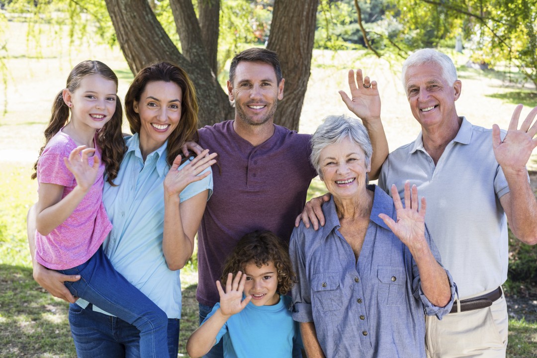 Extended-family-smiling-in-the-park-000069571877_Large